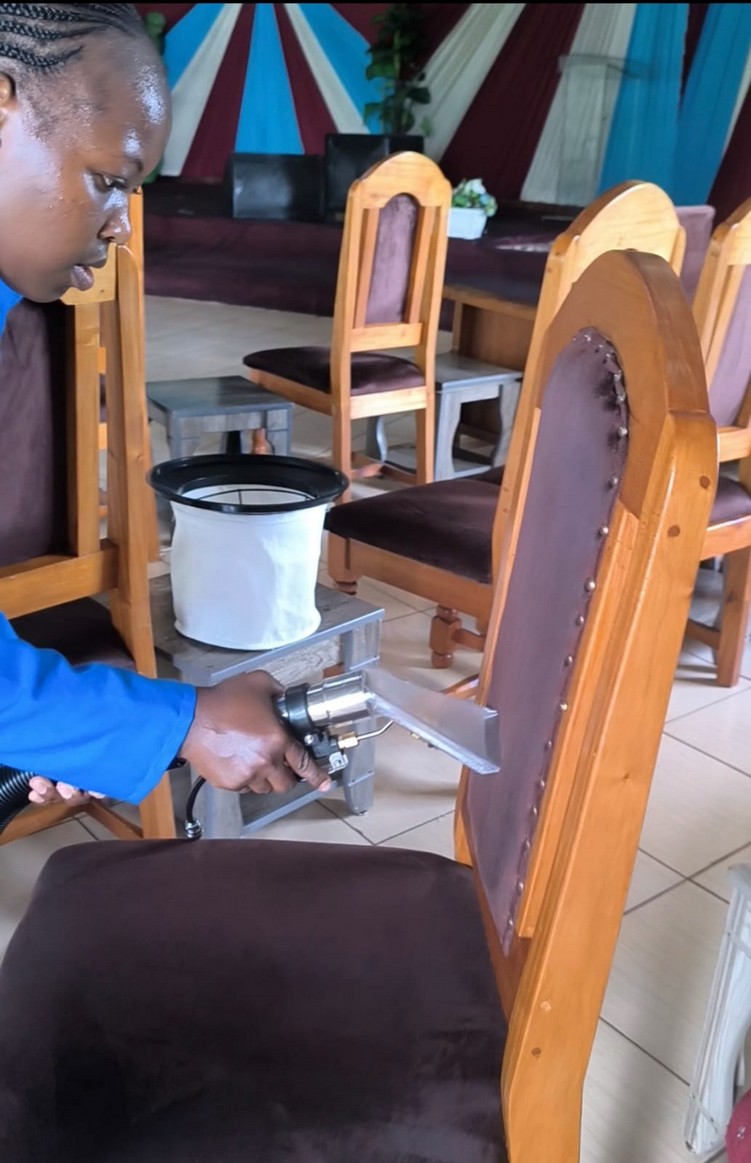 QuaDEL team cleaning church seats
